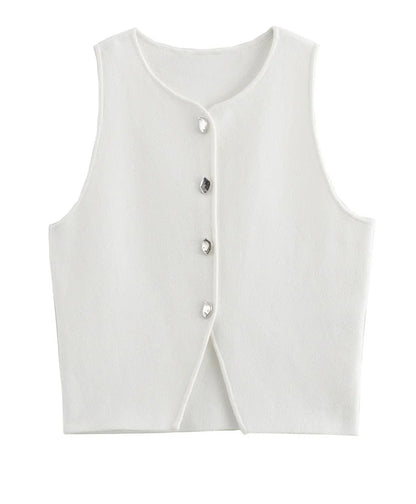 ATELIER | Blouse courte sans manches à boutons et fente